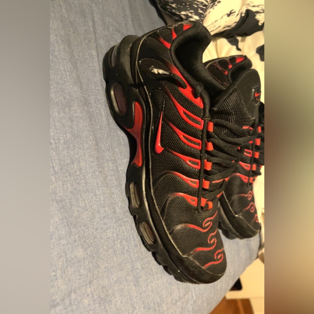 Men Nike shoes. Black and red.